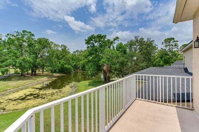 15906 Prince William Pl, Odessa, FL 33556 - balcony featuring a water view and view of scattered trees