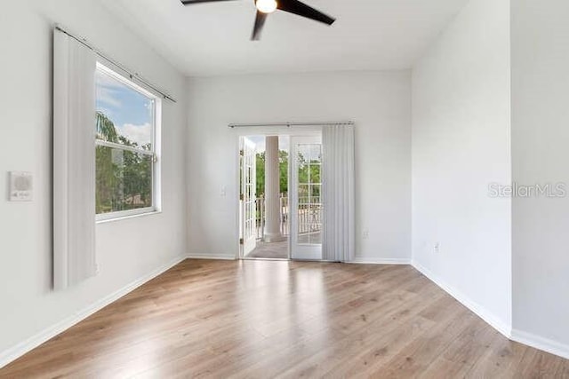 15906 Prince William Pl, Odessa, FL 33556 - empty room with ceiling fan, wood finished floors, and baseboards