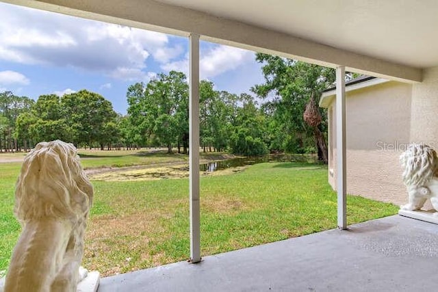 15906 Prince William Pl, Odessa, FL 33556 - view of grassy yard with view of scattered trees and a patio area