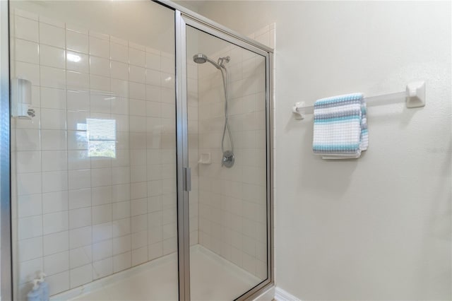 bathroom featuring a stall shower