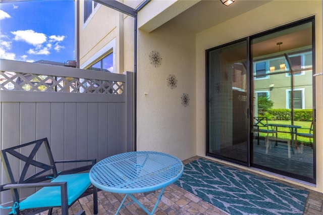 view of patio / terrace featuring fence