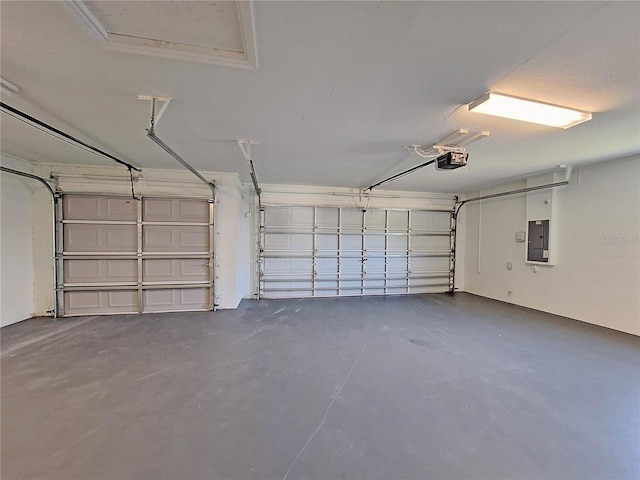 19855 Ellendale Dr, Land O Lakes, FL 34638 - garage with a garage door opener and electric panel