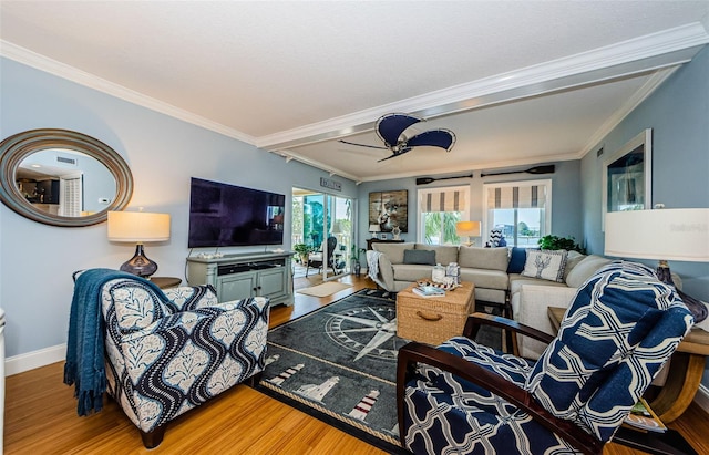 8210 Aquila St Unit 218, Port Richey, FL 34668 - living area with wood finished floors, ornamental molding, baseboards, and a ceiling fan