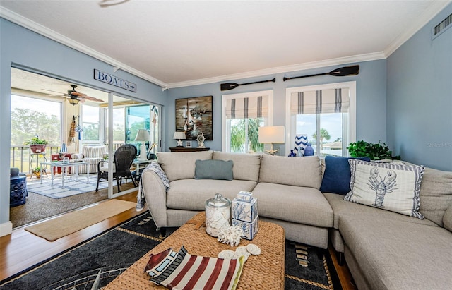 8210 Aquila St Unit 218, Port Richey, FL 34668 - living room with wood finished floors, ornamental molding, and a ceiling fan