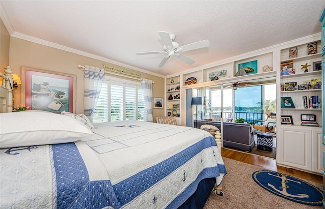 8210 Aquila St Unit 218, Port Richey, FL 34668 - bedroom featuring wood finished floors, ornamental molding, multiple windows, and ceiling fan
