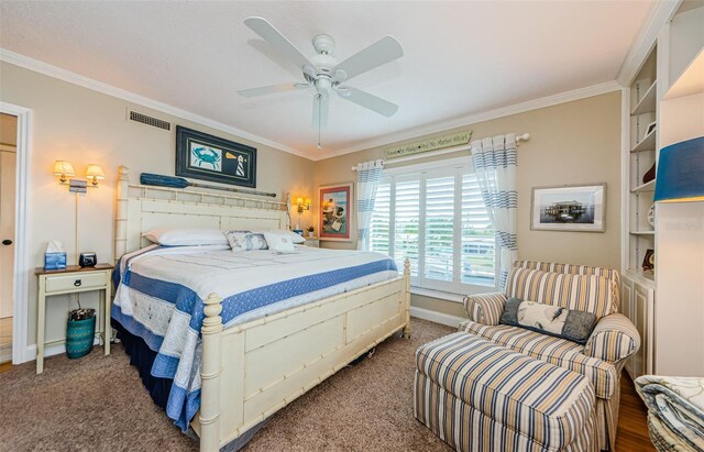8210 Aquila St Unit 218, Port Richey, FL 34668 - carpeted bedroom with ornamental molding, ceiling fan, and baseboards