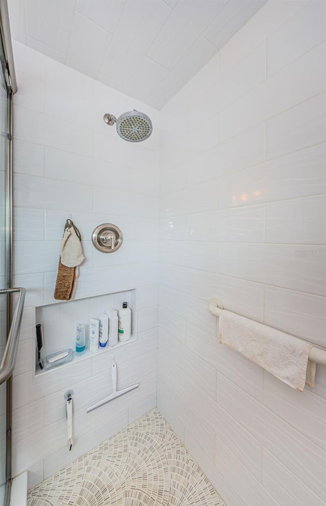 8210 Aquila St Unit 218, Port Richey, FL 34668 - bathroom featuring a tile shower