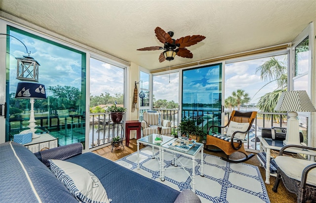 8210 Aquila St Unit 218, Port Richey, FL 34668 - sunroom / solarium with floor to ceiling windows, a textured ceiling, and wood finished floors