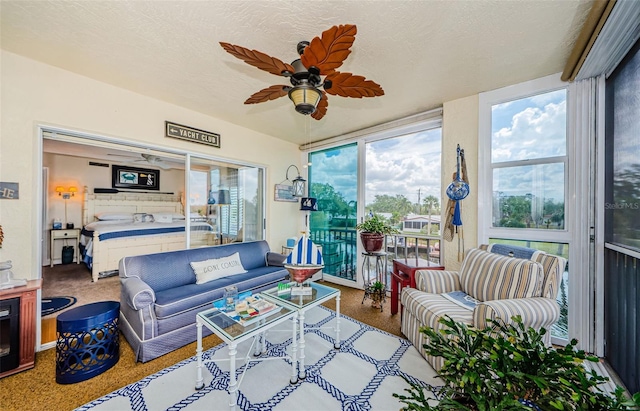 8210 Aquila St Unit 218, Port Richey, FL 34668 - sunroom / solarium with carpet flooring and a textured ceiling