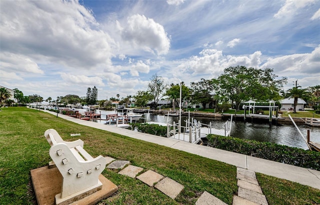 8210 Aquila St Unit 218, Port Richey, FL 34668 - view of home's community featuring a water view, a yard, and a dock