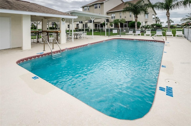 8210 Aquila St Unit 218, Port Richey, FL 34668 - community pool featuring fence and a patio area