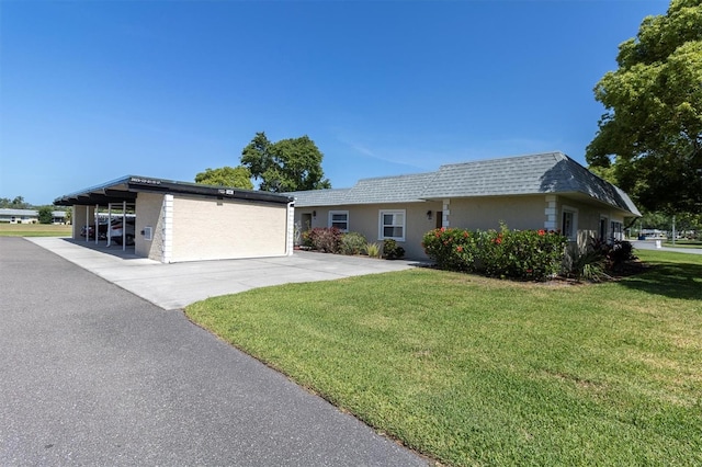 single story home featuring a front yard
