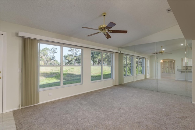 unfurnished sunroom featuring visible vents and a wealth of natural light