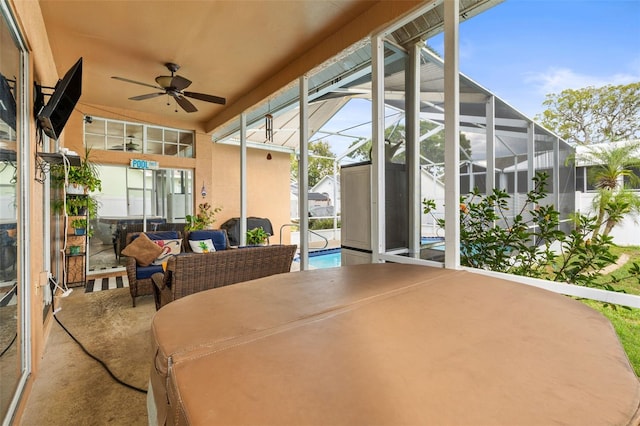 12040 Penzance Ln, New Port Richey, FL 34654 - sunroom featuring ceiling fan