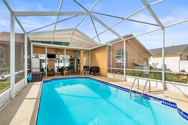 12040 Penzance Ln, New Port Richey, FL 34654 - outdoor pool featuring an outdoor hangout area, a lanai, ceiling fan, and a patio area
