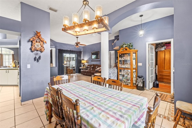 12040 Penzance Ln, New Port Richey, FL 34654 - dining space featuring light tile patterned floors, a wealth of natural light, and visible vents