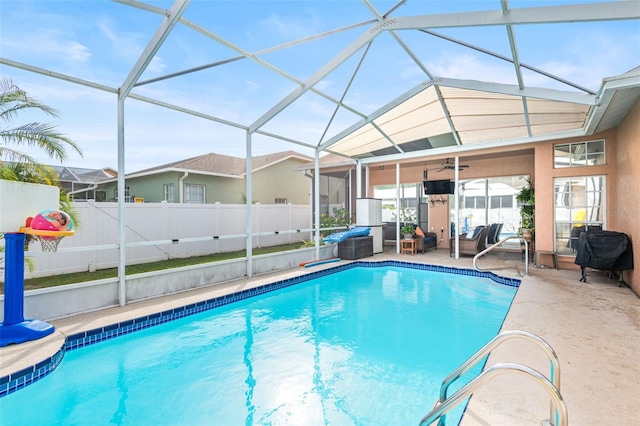 12040 Penzance Ln, New Port Richey, FL 34654 - view of pool with a patio area, ceiling fan, and a lanai