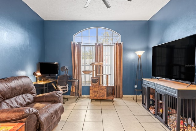 12040 Penzance Ln, New Port Richey, FL 34654 - office space with light tile patterned floors, a ceiling fan, baseboards, and a textured ceiling