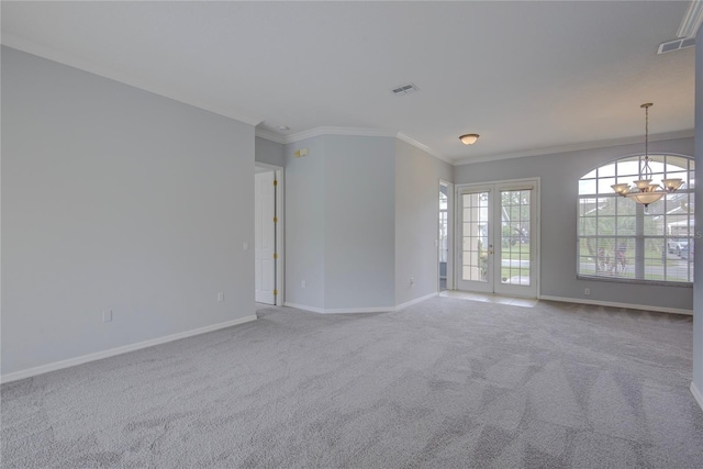 7827 Starfire Way, New Port Richey, FL 34654 - carpeted spare room featuring a chandelier, baseboards, and ornamental molding