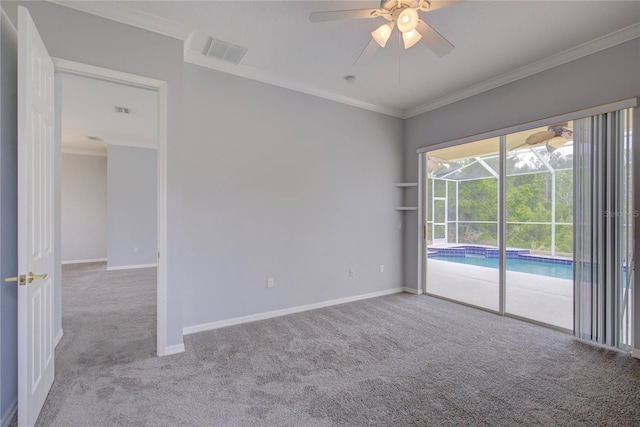 7827 Starfire Way, New Port Richey, FL 34654 - unfurnished room featuring carpet flooring, a ceiling fan, ornamental molding, and baseboards