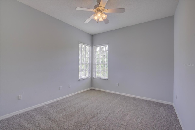 7827 Starfire Way, New Port Richey, FL 34654 - carpeted empty room featuring baseboards and a ceiling fan