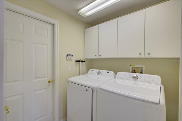 7827 Starfire Way, New Port Richey, FL 34654 - washroom featuring cabinet space and independent washer and dryer