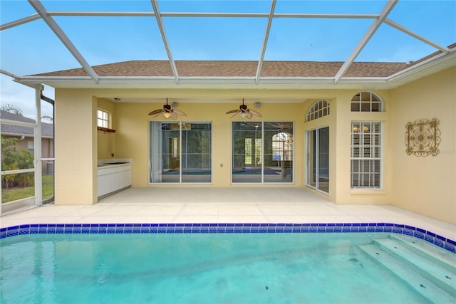 7827 Starfire Way, New Port Richey, FL 34654 - outdoor pool featuring a lanai, a patio area, and a ceiling fan