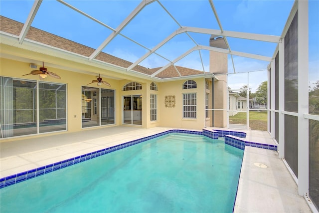 7827 Starfire Way, New Port Richey, FL 34654 - view of pool with ceiling fan, a patio area, a pool with connected hot tub, and a lanai