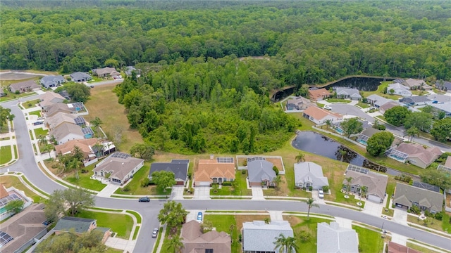 7827 Starfire Way, New Port Richey, FL 34654 - aerial view of property's location featuring a heavily wooded area and nearby suburban area