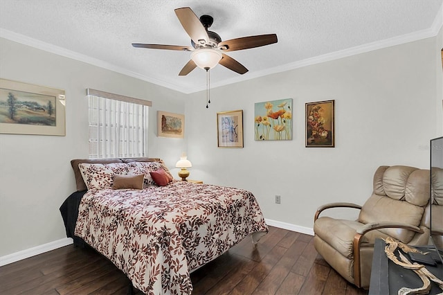 6219 Wilds Dr Unit 11A, New Port Richey, FL 34653 - bedroom featuring dark wood-style floors, baseboards, a textured ceiling, ornamental molding, and a ceiling fan
