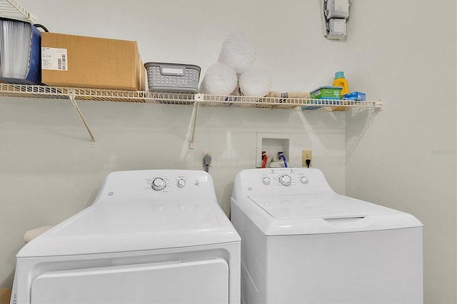 6219 Wilds Dr Unit 11A, New Port Richey, FL 34653 - washroom featuring washing machine and dryer