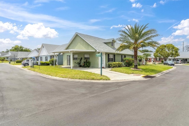 6219 Wilds Dr Unit 11A, New Port Richey, FL 34653 - view of front of home featuring a front yard