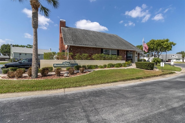 6219 Wilds Dr Unit 11A, New Port Richey, FL 34653 - community sign featuring a yard