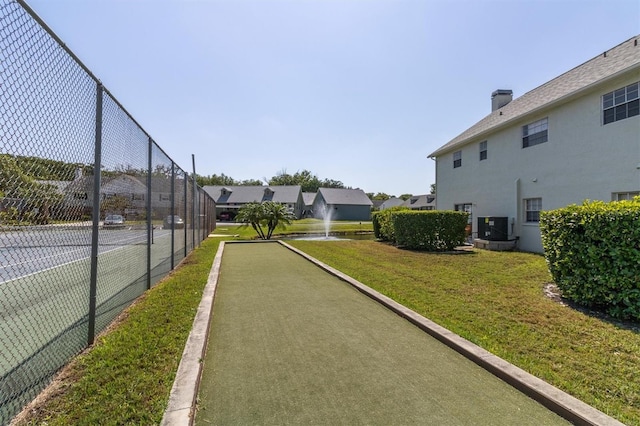 6219 Wilds Dr Unit 11A, New Port Richey, FL 34653 - surrounding community with a game area and a residential view