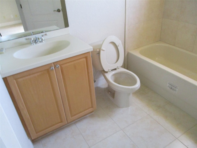 full bath with toilet, tile patterned flooring, and vanity
