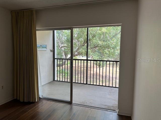 840 Virginia St Unit 202, Dunedin, FL 34698 - entryway with wood finished floors and a wealth of natural light