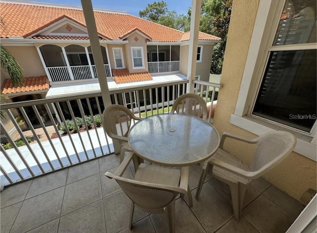 21008 Sunpoint Way Unit 204, Lutz, FL 33558 - balcony featuring outdoor dining space