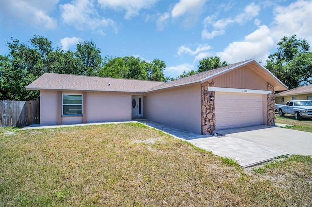 2660 Orangewood Ct, Palm Harbor, FL 34684 - ranch-style home with an attached garage, fence, stucco siding, and concrete driveway
