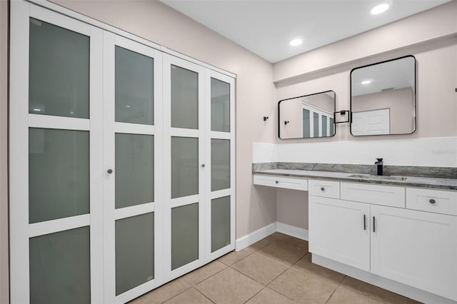 2660 Orangewood Ct, Palm Harbor, FL 34684 - bathroom featuring baseboards, recessed lighting, tile patterned floors, and vanity