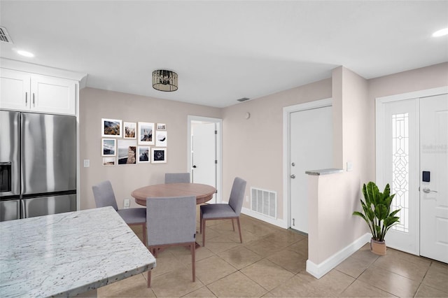 2660 Orangewood Ct, Palm Harbor, FL 34684 - dining space featuring visible vents, recessed lighting, baseboards, and light tile patterned floors