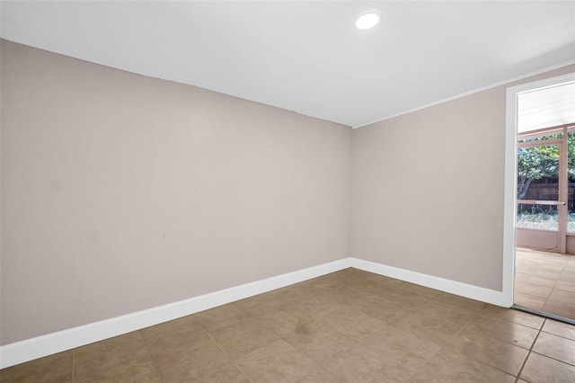 2660 Orangewood Ct, Palm Harbor, FL 34684 - spare room featuring light tile patterned flooring, baseboards, and recessed lighting
