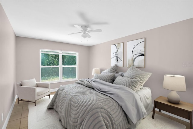 2660 Orangewood Ct, Palm Harbor, FL 34684 - bedroom with light tile patterned flooring, baseboards, and a ceiling fan