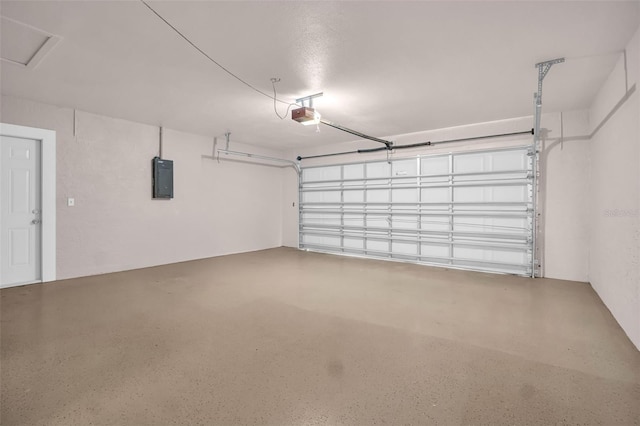 2660 Orangewood Ct, Palm Harbor, FL 34684 - garage with a garage door opener and electric panel