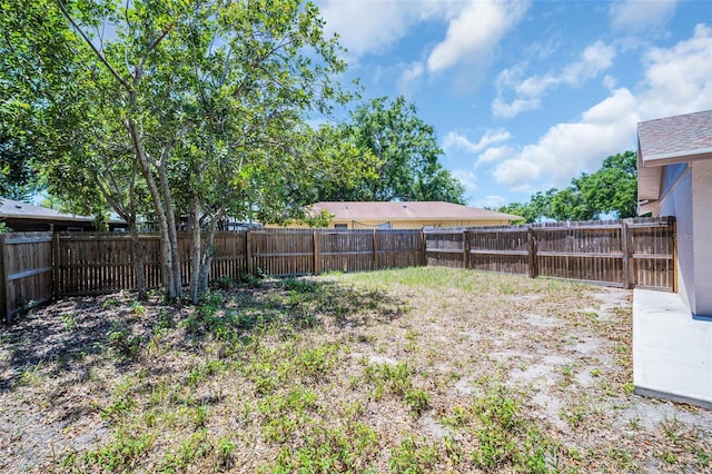 2660 Orangewood Ct, Palm Harbor, FL 34684 - view of yard featuring a fenced backyard
