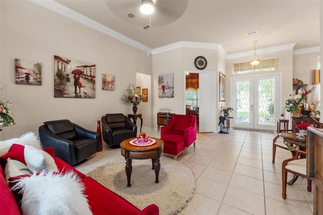 living room featuring ceiling fan, french doors, visible vents, crown molding, and light tile patterned floors