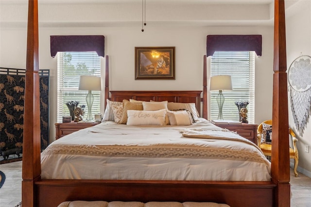 bedroom with wood finished floors