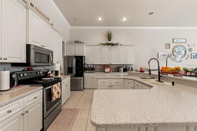 kitchen with crown molding, appliances with stainless steel finishes, tasteful backsplash, light tile patterned floors, and a sink