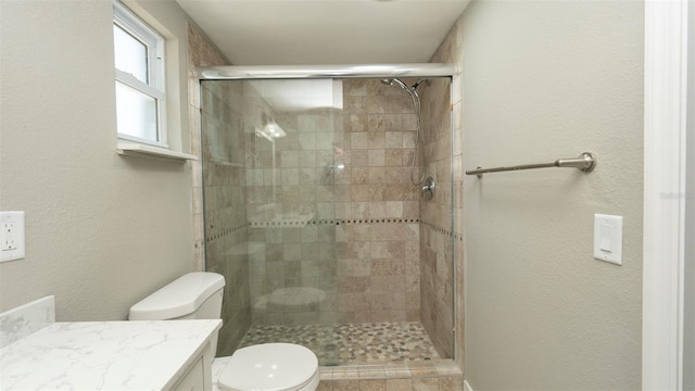8522 Inwood Dr, Hudson, FL 34667 - full bathroom with vanity, toilet, and a stall shower