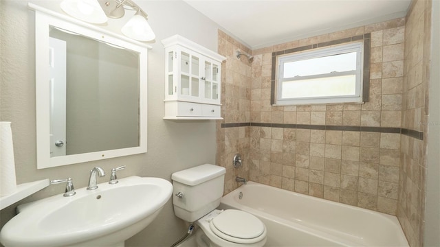 8522 Inwood Dr, Hudson, FL 34667 - bathroom with toilet, a sink, and shower / bathing tub combination