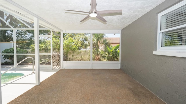 8522 Inwood Dr, Hudson, FL 34667 - unfurnished sunroom featuring a ceiling fan